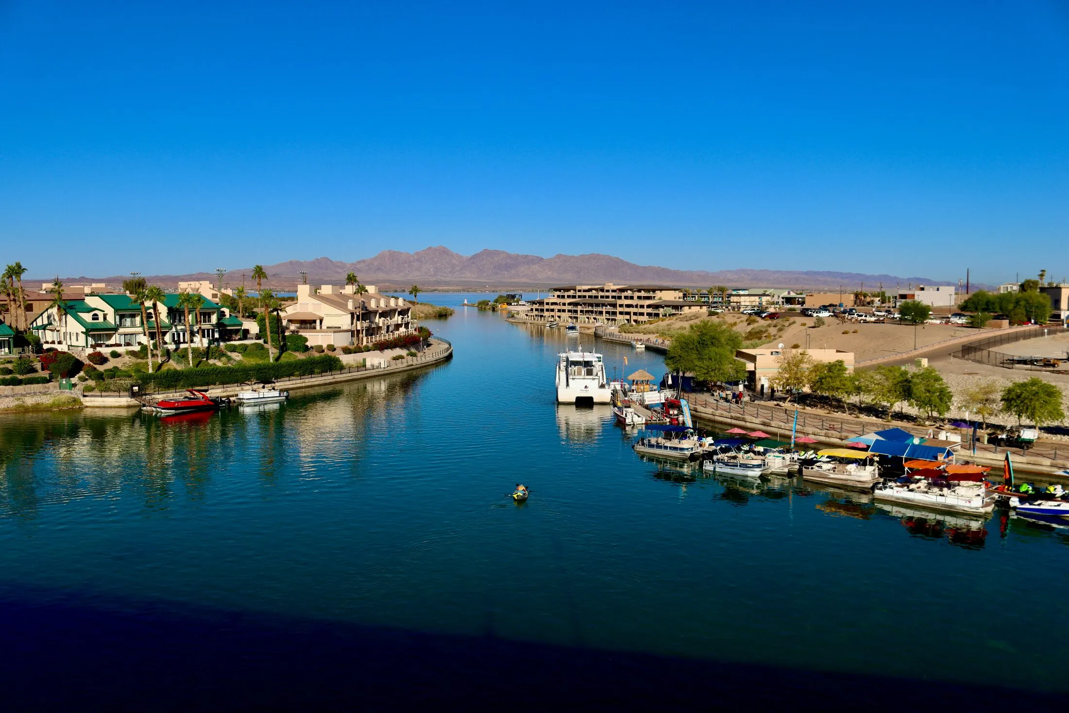 Stock photo — the Bridgewater Channel and desert bluffs in Lake Havasu City, AZ.